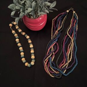 Two wooden multi colored necklaces
